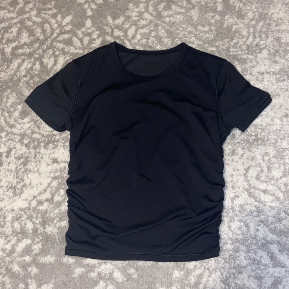 This shirt is a tight t-shirt with a scrunched side